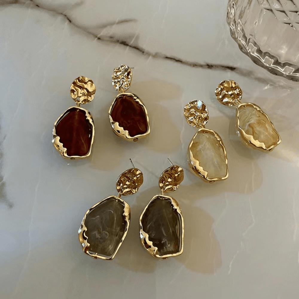 A pair of resin geometry earrings Fashion earrings Vintage irregular pendants temperament studs