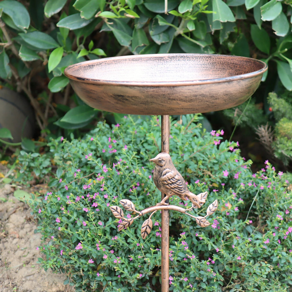 A wrought iron bird bath and feeder in one, featuring a rust-proof design and a stable 5-prong ground stake.  Perfect for garden