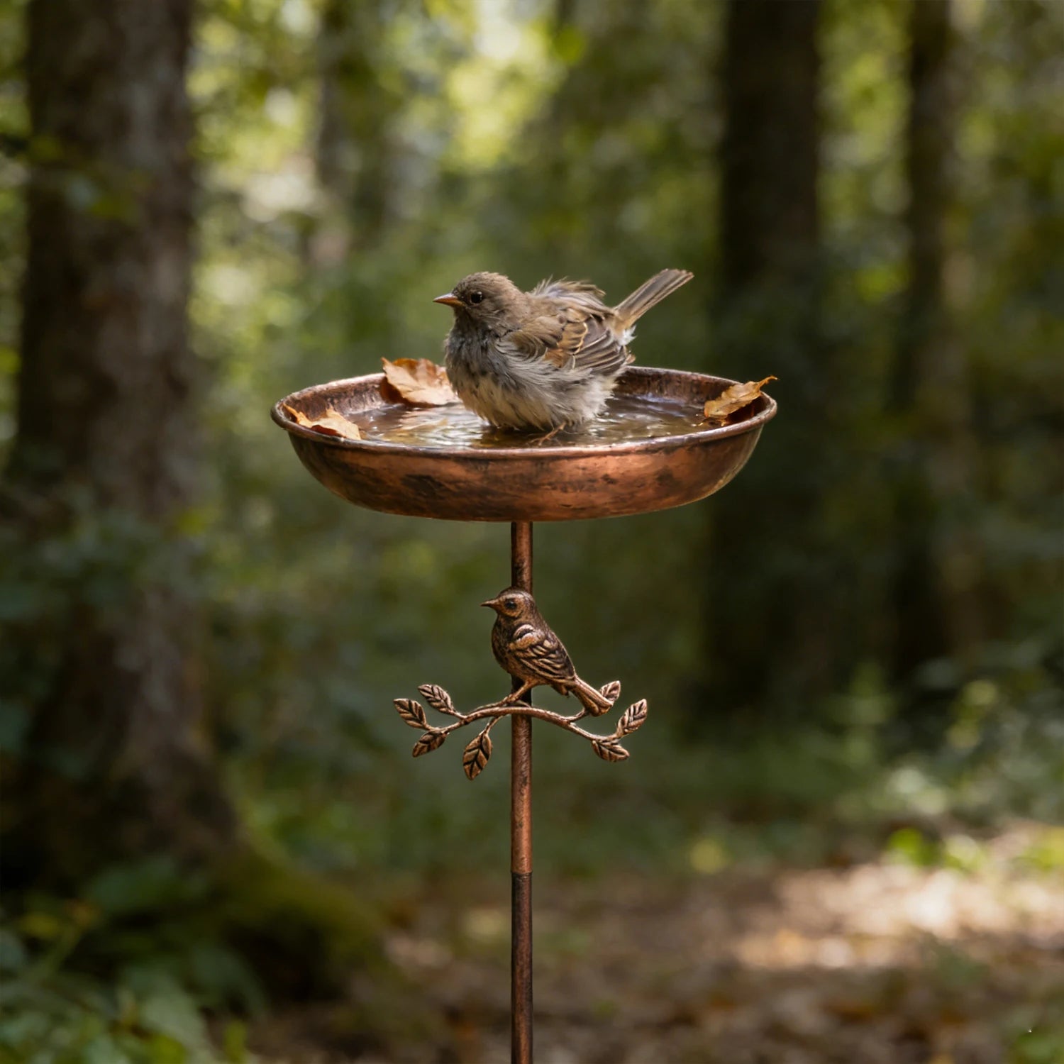 A wrought iron bird bath and feeder in one, featuring a rust-proof design and a stable 5-prong ground stake.  Perfect for garden