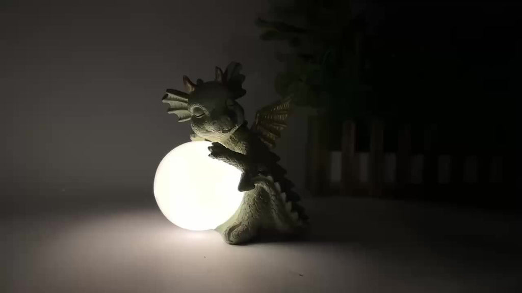 XXOASIS Solar-Powered Dinosaur Holding Light Statue - Whimsical Resin Garden Ornament with Illuminated Feature, Rechargeable via Outdoor Lawn Decoration, Dinosaur Room Decor